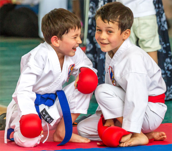 Martial arts friends smiling and having a good time