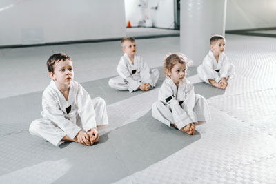 Martial arts students looking bored